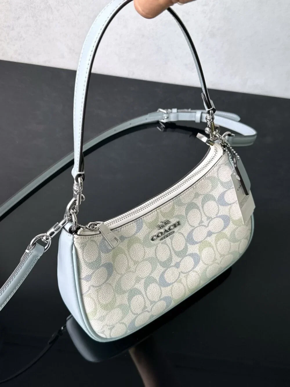 Coach signature coated‑canvas